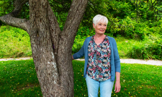 Cherie MacLeod standing outside next to a tree in the South Shore.