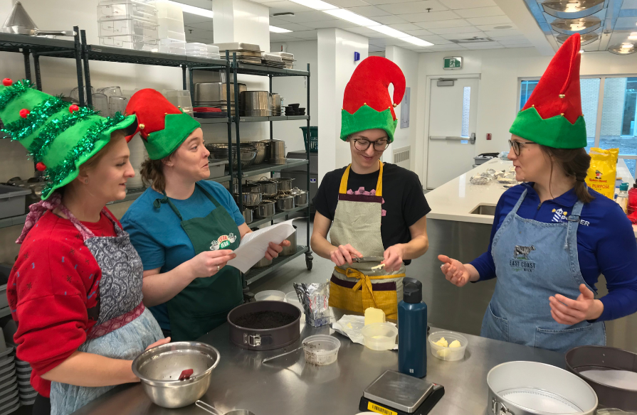 The Byers sisters in process of making the cheesecakes at NSCC's Kingstec Campus.