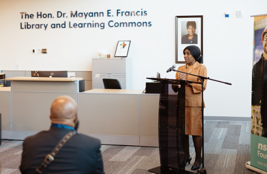 The Honourable Dr. Mayann Francis speaking at unveiling event.