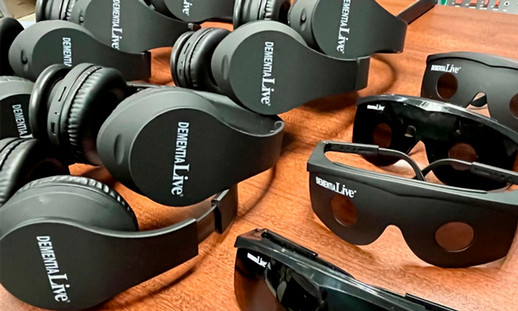 Image shows headphones and dark glasses that are part of the Dementia Live simulation.