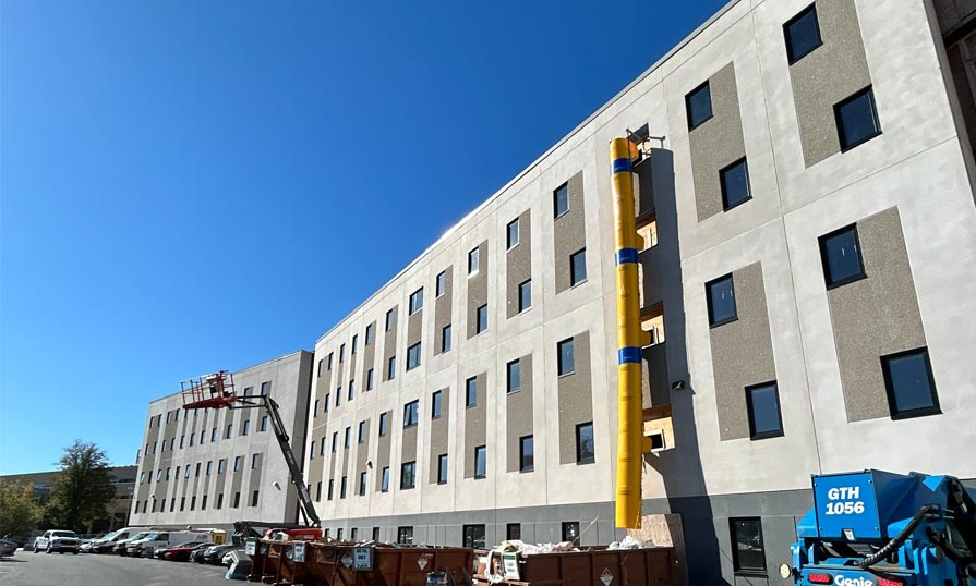 Image shows the outside of NSCC's Ivany Campus' new student housing under construction.