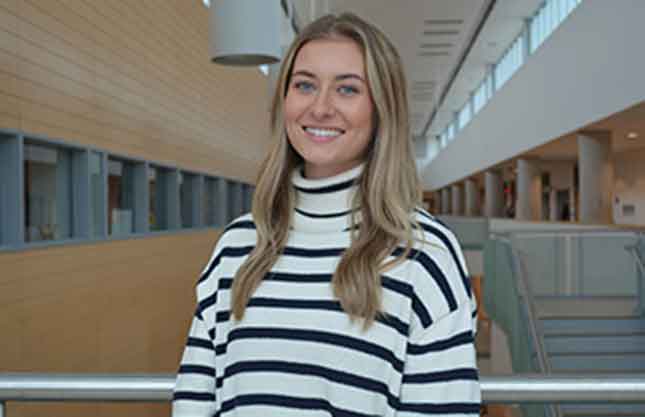 Headshot of a smiling Emma at Ivany Campus.