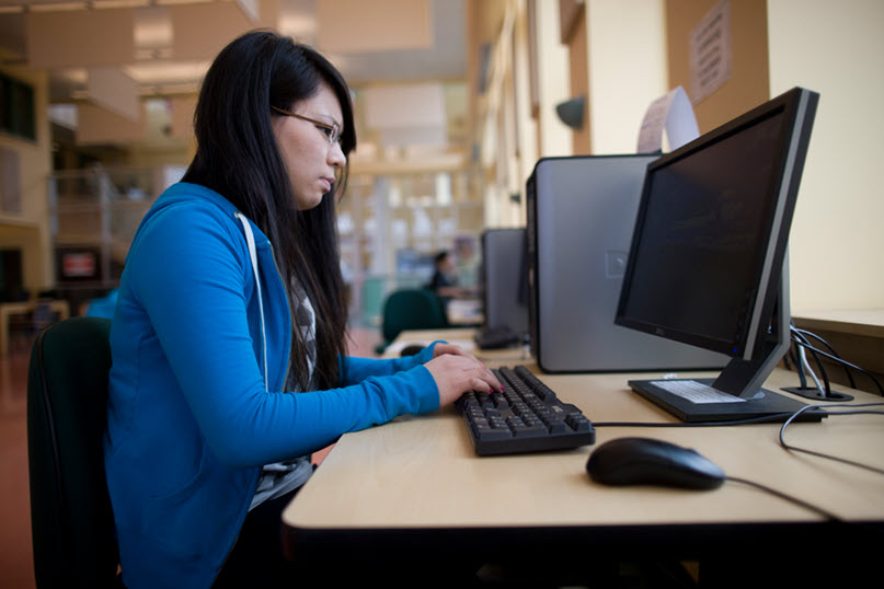 student working on computer