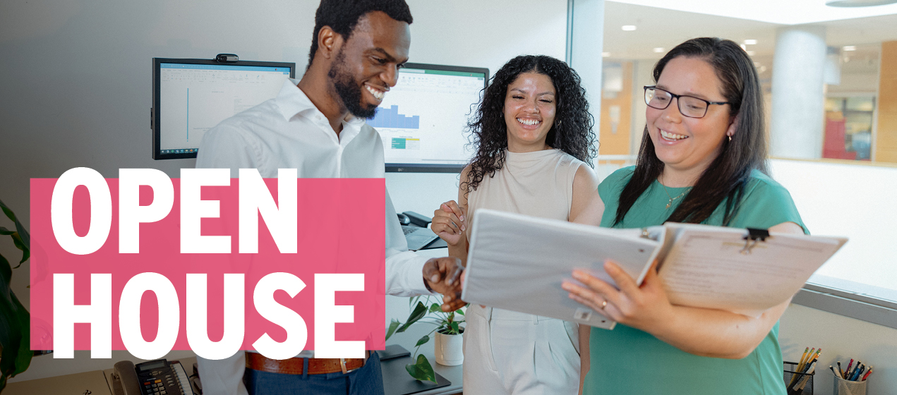 Three Administrative Professional students stand together in an Ivany Campus classroom looking and smiling at an open binder folder held by one of the students. Text reads: Open House