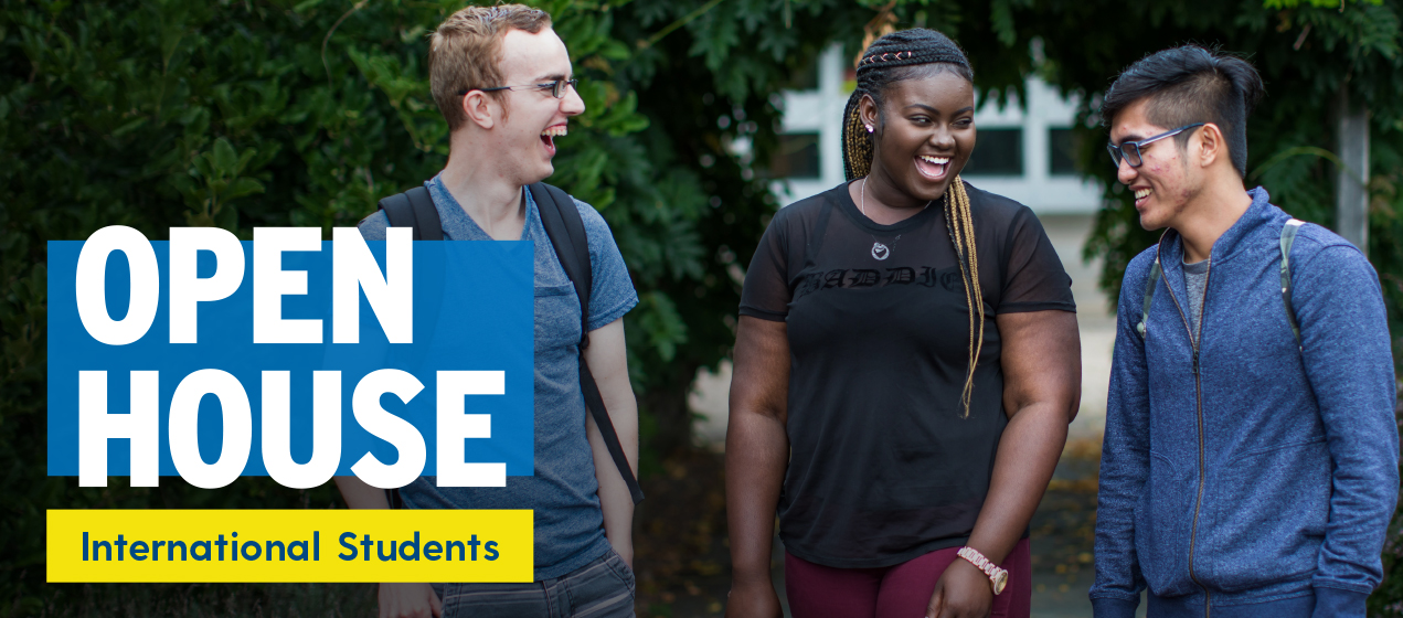 Three NSCC International students stand together outside an NSCC campus.